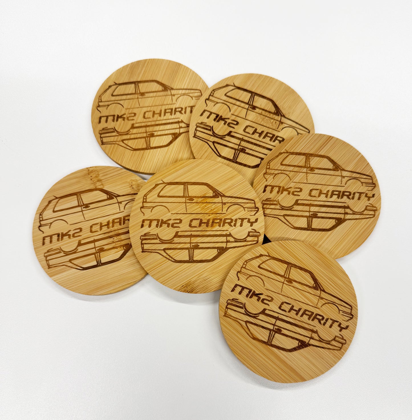 MK2 Charity Untersetzer-Set – 6 Bambus-Untersetzer im Jutebeutel
