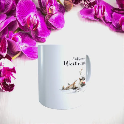 Tasse "Entspannte Weihnachten – Rentier mit Geschenk"